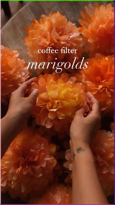 coffee filter margolds are being used to make flower petals for the flowers