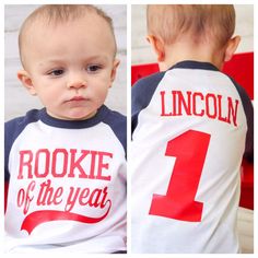 a baby wearing a shirt with the number one on it