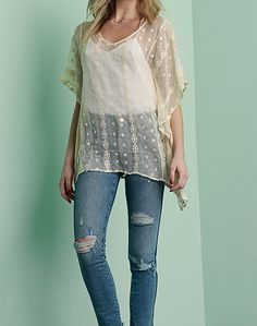 Dress in dreamy elegance with our Silk Chiffon Embroidered Tunic. Made of 100% silk, its sheer finish is beautifully complemented by intricate embroidery, evoking a bohemian charm. Ideal for layering, this delicate embroidered tunic offers a relaxed vibe, making it perfect for those seeking a blend of comfort and style on a warm, carefree day. 100% silk Embroidered Sheer V-neck Dry clean Item # 30315 Sheer Shorts, Embroidered Tunic, Intricate Embroidery, Embroidered Silk, Silk Chiffon, Neck Collar, Silk Fabric, Layering, Chiffon