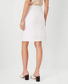 Elevate your wardrobe with the Ann Taylor Tall Belted A-Line Skirt, a testament to timeless elegance and comfort. This skirt is meticulously crafted from a blend of 78% cotton, 20% rayon, and 2% spandex, ensuring both durability and a slight stretch for the perfect fit. The crisp white color makes it a versatile choice for various occasions.

- Size: 4 (Tall)
- Color: White
- Material: 78% Cotton, 20% Rayon, 2% Spandex
- Gender: Female
- Length: 22 inches long
- Features: Includes a self-tie buc Chic Skirts, White Belt, Skirt Belt, Cotton Skirt, Buckle Belt, Cinched Waist, White Material, White Skirts, Polished Look