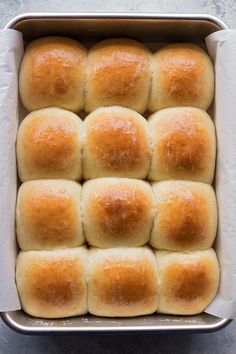 a pan filled with rolls sitting on top of a counter