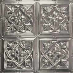 a metal ceiling tile with four different designs on the front and back panels, all in silver