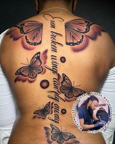 the back of a woman's upper body with butterflies on it and an inscription