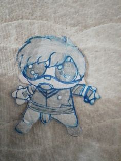 a drawing of a cartoon character on a piece of cloth