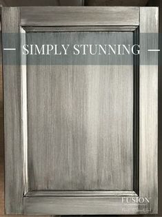 an old door is painted silver and has the words simply stuinning on it