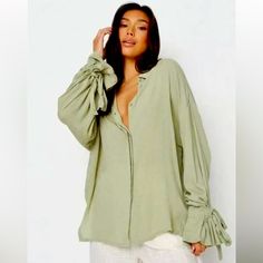 Missguided Khaki Slv Xtreme Oversize Cheesecloth Tie Sleeve’s Blouse Top Shirt Cheesecloth Button Front Hidden Buttons Light Green 22” Armpit To Armpit 26.5 Shoulder To Hem New With Tags Womans Size 8/P Oversized Green Blouse For Day Out, Relaxed Fit Long Sleeve Shirt For Brunch, Oversized Button-up Top For Brunch, Oversized Green Tops For Daywear, Green Oversized Tops For Daywear, Green Blouse With Roll-up Sleeves For Spring, Chic Oversized Green Blouse, Oversized Khaki Blouse For Spring, Oversized Long Sleeve Blouse For Brunch