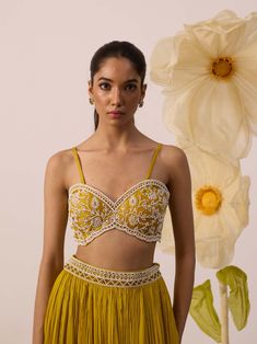 Dazzle in sunshine hues with this yellow cape lehenga set! Showcasing intricate pearl work on this beautiful palette of yellow. The blouse has extensive pearl embroidery that is based on net, the cape is on organza, and features scalloping throughout. A perfect ensemble for all your day events. Cape Lehenga, Yellow Lehenga, Pearl Work, Pearl Embroidery, Lehenga, Magnolia, Cape, Blouses, Embroidery