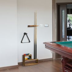 a pool table in the middle of a room