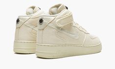 The Stussy x Nike Air Force 1 Mid “Fossil” is one of multiple colorways of the retro basketball shoe co-designed by the California based streetwear brand and released in May 2022.  The Air Force 1 Mid “Fossil” is a popular release by Stussy and Nike that follows the brand’s previous collaboration on the Air Force 1 from 2020.  The design features a fossil or beige hemp base with tonal hemp overlays.  The Swoosh logo on the sides is designed in a woven textile.  Classic “Stussy” branding is embro Stussy Fossil, Nike Air Force 1 Mid, Retro Basketball Shoes, Nike Air Force 1 High, Air Force 1 Mid, Cute Shoes Heels, Streetwear Shoes, Air Force 1 High, Nike Air Force 1 Low