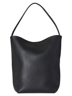 Shop The Row Park Leather Tote | Saks Fifth Avenue Bag Minimalist, نظارات شمسية, Leather Shoulder Handbags, Leather Bucket Bag, Leather Bucket, Black Tote Bag, Leather Design, Shoulder Handbags, Large Bags