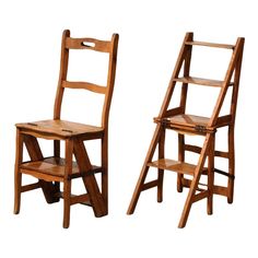 two wooden ladders sitting next to each other