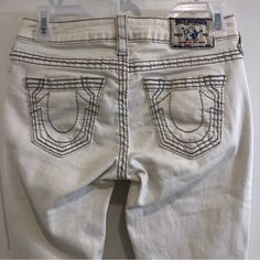 True Religion Women’s All White Skinny Fit Jeans. Nwot. (New Without Tags) Size (26 Waist) (35 Inseam) These Come Super Long, When They’re New, So Unless You’re 6’2, They’ll Probably Need To Be Hemmed. Gray Oversized Stitching. New Condition. Flaws- These Jeans Were A Demo Model On A Store Mannequin, So There Are A Few Small Smudges On The Legs (Pictures Included) I’m Pretty Sure The Smudges Will Come Out In The Wash, But I Haven’t Washed Them So I’m Not 100% Positive. Sold As Is. White True Religion Jeans, Store Mannequins, True Religion Jeans, All White, True Religion, Fit Jeans, White Jeans, Vision Board, Stitching