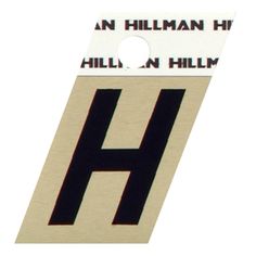 a white and black sign with the letter h on it's bottom half is shown