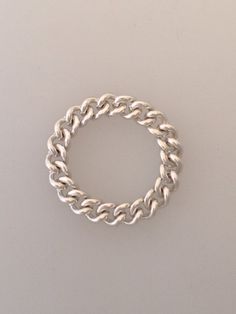 Beautifully simple curb chain ring in sterling silver which slides easily on & off your finger.  Wear it as a single, or stacked with others!  This silver chain ring looks and feels better the more it's worn.  * If you'd like the ring oxidised, just mention it when ordering!  For more rings take a look: www.etsy.com/uk/shop/LapisAndCoral?section_id=16611775&ref=shopsection_leftnav_1 width approx: 4mm height approx: 3mm This item is made to order, so please allow up to 10 working days for delivery. You can view more beautiful jewellery here: LapisAndCoral.etsy.com Ring sizes: The best way to find out your ring size is to simply pop into your local jeweller and have them professionally size it. The alternative is to search: 'ring sizes', and print out a chart for reference. Silver Chain Ring, Gold Texture, Chain Ring, Curb Chain, Stackable Rings, Uk Shop, Pearl White, Silver Chain, Beautiful Jewelry