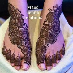 feet with henna designs on them