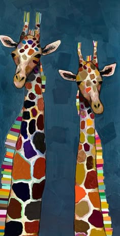 two giraffes standing next to each other on a blue background