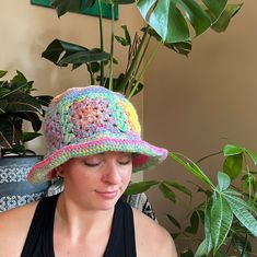 hand crocheted multicolored bucket hat. the slightly floppy brim can be shaped loosely. stretchy and comfy and cute! this hat is a bit oversized, allowing a comfy loose fit. Casual Hand Knitted Sun Hat, Casual Hand Knitted Sun Hat Cap, Casual Hand Knitted Sun Cap, Casual Crochet Cap Sun Hat, Colorful Adjustable Casual Crochet Hat, Casual Adjustable Colorful Crochet Hat, Casual Colorful Adjustable Crochet Hat, Colorful Adjustable Crochet Hat, Colorful Casual Wide Brim Hat