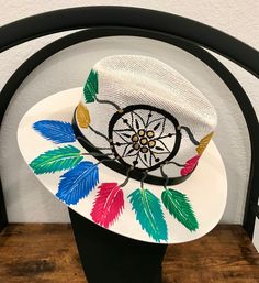 One of my favorites! Hat is sized medium but is lined with elastic so it fits most everyone! White Bohemian Bucket Straw Hat, White Bohemian Straw Bucket Hat, White Bohemian Bucket Hat, Multicolor Fedora Straw Hat, Multicolor One Size Fedora Straw Hat, Multicolor One-size Fedora Straw Hat, Multicolor One Size Fits Most Fedora Straw Hat, White Brimmed Fedora For Festival, Artisan Brimmed Fedora For Summer