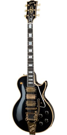 a black and gold electric guitar is shown on a white background, with the top part of it's neck exposed