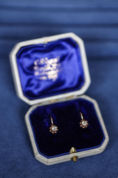 A beautiful and original pair of solid yellow gold buttercup earrings set with a sparkling pair of natural European antique cut diamonds. High quality originals made in Berlin, Germany and fitted with the original royal blue velvet box. These earrings are perfect antique diamond earrings for everyday wear. Elegant and timeless and easy to wear. The hooks and the clips are in excellent wearable condition.  This pair of earrings will be beautifully packaged for safe delivery with complimentary del Classic Hallmarked Yellow Gold Diamond Earrings, Elegant Diamond Earrings With Single Cut As Gift, Elegant Diamond Earrings With Single Cut Diamonds As Gift, Elegant Single Cut Diamond Earrings As Gift, Anniversary Yellow Gold Earrings With Single Cut Diamonds, Victorian 14k Gold Earrings For Anniversary, Victorian Brilliant Cut Diamond Earrings For Anniversary, Diamond Cut Yellow Gold Earrings As Gift, Victorian Yellow Gold Earrings For Gift