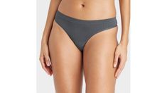 Go all day in comfort & confidence with the Seamless Thong from Auden™. Made from soft fabric with added spandex for a flattering fit, this seamless thong offers opaque coverage. The seamless design makes it easy to wear with skirts, shorts & pants of your choice. Auden™ Comfort true to every shape & hue. | Auden Women's Gray Seamless Thong (Large) | Target Shorts Pants, Short Pants, Soft Fabric, Soft Fabrics, Target, Confidence, Spandex, Grey, Pants