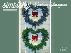 two christmas wreaths with red bows on them hanging from a window sill in front of a green wall