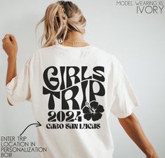 Get our custom girl's trip shirts for your upcoming girls trip getaway! Personalize location in personalization box! Please message us if you have any questions, please message us! **UNISEX T-SHIRTS- Run true to size.  If wanting a more oversized look, selecting 2 sizes up is recommended. **CUSTOMIZATION-If you would like this design in a different color or on a different item (t-shirt, sweatshirt, tank top, bag, hat, etc.)-please message us and we will do our very best to get it made for you. Ladies Weekend Shirt Ideas, Vacation Tshirt Ideas Group, Group Tshirt Ideas Friends, Girls Beach Trip, Vacation Tshirt, Girls Weekend Gifts, Vacation Tshirts, Matching Friend, Travel Tshirt