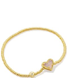 From Kendra Scott&#x2C; this bracelet features:Stretch bracelet14K gold over brass Stretch&#x2C; no closure Approx. 6.5" unstretched length Imported. Gold Stackable Heart Bracelets, Gold Heart-shaped Stackable Bracelets, Gold Adjustable Heart Shaped Stretch Bracelet, Adjustable Gold Stretch Bracelet With Heart Charm, Adjustable Gold Heart Stretch Bracelet, Adjustable Gold Heart-shaped Stretch Bracelet, Gold Heart-shaped Adjustable Stretch Bracelet, Gold Charm Bracelet With Heart Charm And Adjustable Fit, No Closure