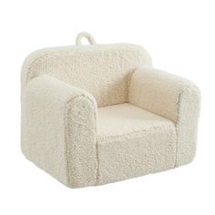 a white chair that is made out of sheep's wool and has a handle on it