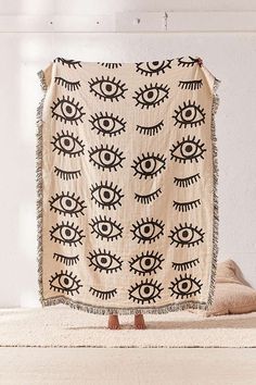 a blanket with an eye pattern on it