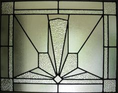 a stained glass window with an abstract design