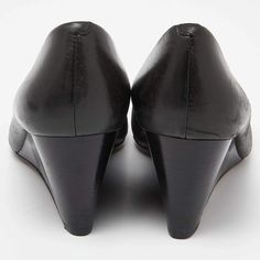 description: Make a chic style statement with these designer pumps. They showcase sturdy heels and durable soles, perfect for your fashionable outings!.gender: Women.includes: The Luxury Closet Packaging.Size: US 6 (IT 36.5/UK 3.5).Exterior Material: Leather.Lining Material: Leather.Insole Material: Leather.Sole Material: Leather.Origin: China.Hardware: Gold Tone.Closure Type: Slip On.Outsole Length: 22.5 cm.Outsole Width: 8.5 cm.Heel Size: 7 cm.Condition:.Good.In good condition with minor scuffs on exterior, normal wear on sole, slight darkening on few areas. Leather Heels With 4-inch Heel, Modern Wedge Heels With Reinforced Heel, Chic High Heel Wedge Sandals With Reinforced Heel, Modern Formal Wedge Sandals With 4-inch Heel, Modern Round Toe Heels With Branded Heel Counter, Casual Heels With Rubber Heel Cap, Chic Wedge Sandals With Reinforced Heel And Round Toe, Chic Wedge Heels With Padded Heel, Chic Padded Wedge Heels