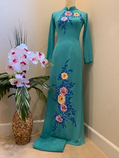 Brand New High Quality Vietnamese Ao Dai.  Fast/Free Priority shipping (1-3 days delivery) via USPS. Size Bust/Chest  Waist S30in/76cm25in/63cm M32in/81cm26in/66cm L33in/84cm28in/71cm XL36in/91cm31in/79cm 2XL37in/94cm33in/84cm Ao Dai Length is 56in Pants Length is 44in Please note:  Almost all Ao Dai have some sewing Chalk Marks because these are Brand New, unwashed Ao Dai.  Gently hand wash the areas will remove the marks. Thank you, aodaithuyanh.etsy.com Return and Exchange Policy: Exchange fo Green Ao Dai, Dress With Pants, Ao Dai Vietnamese, Vietnamese Ao Dai, Dress Clothes For Women, Double Layer, Long Dress, High Neck Dress, Dress Outfits