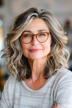 Textured Shoulder-Length Waves Hairstyle for Women Over 40 with Glasses. Older Women Hairstyles Medium Over 60 Shoulder Length, Hairstyles For Dry Hair, Waves Shoulder Length Hair, Shoulder Length Hair With Layers Over 50, Waves Hairstyle For Women, Short Curly Gray Hair Over 50, Hairstyle For Women Over 40, Shoulder Length Bob Hairstyles, Hairstyles For Women With Glasses