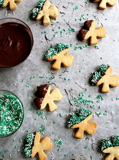 some cookies with sprinkles are on a table