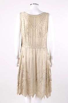 For Sale on 1stDibs - COUTURE c.1920’s One-of-a-kind Champagne Silk Floral Glass Beaded Rhinestone Flapper Dress Circa: 1920’s Style: Flapper Dress Color(s): Champagne Lined: 1920s Embellished Flapper Cocktail Dress, 1920s Embellished Cocktail Flapper Dress, 1920s Embellished Flapper Dress For Wedding, Art Deco Embellished Flapper Dress For Vintage Events, Vintage Embellished Flapper Dress For Cocktail, Pink Flapper Dress, 1920s Evening Dress, 1930s Wedding Dress, 1920's Wedding