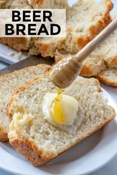 a white plate topped with sliced bread and butter