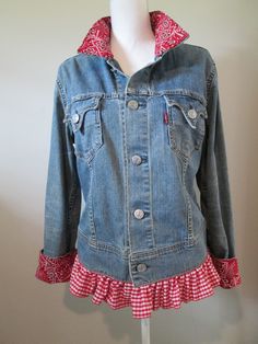 a blue jean jacket with red and white checkered ruffles