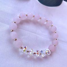 8mm matte rose quartz made with 8mm swarovski crystal rondelles Pretty Jewelry Necklaces, Beaded Bracelets Tutorial, Swarovski Crystal Jewelry, Swarovski Crystal Bracelet, Rose Quartz Gemstone