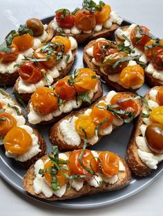 an assortment of appetizers are arranged on a plate