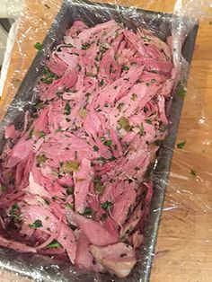 the meat is being prepared and ready to be put into the oven for roasting