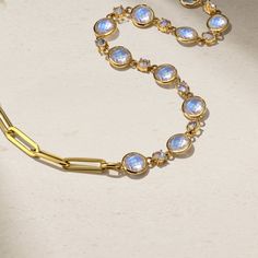 This striking and versatile piece is strung with a beautiful assortment of glowing moonstones that are scattered along one half of the necklace and completed with chunky links along the other half. It makes a bold statement on its own, but can also be layered with other styles. Metal: 18kt Gold Moonstone Weight: 20.00 ct. Measurements: 16" total length *Please note that the listed ct. weights are approximate and may be subject to slight variations. Luxury Gold Moonstone Jewelry, Gold Moonstone Jewelry With Stones, Gold Moonstone Necklace For Formal Occasions, Formal Gold Moonstone Necklace, Half Necklace, Paperclip Necklace, Alexandrite Ring, Half And Half, The Other Half