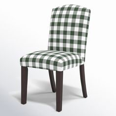 a green and white checkered chair with dark wood legs on an isolated background,