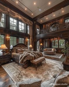 a large bedroom with lots of windows and wooden furniture in it's center area