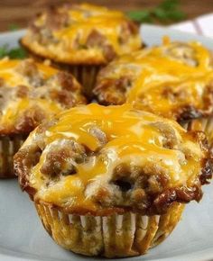 some meat and cheese muffins on a white plate