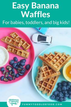 two plates with waffles, blueberries and yogurt are on the table