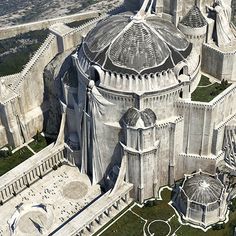 an aerial view of a building with many spires and domes on the top of it