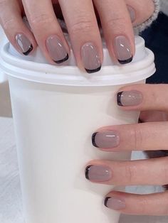 gray jelly nails with black French tips Dark Tip French Manicure, Tan Nails With Black Tips, Fun Basic Nails, Brown And Black French Tip Nails, Dark French Manicure, Tuxedo French Tip Nails, Triangle French Tip Nails Short, Black And Tan Nail Ideas, Taupe French Tip Nails