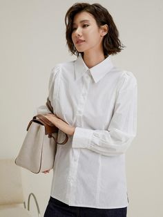 This is a feminine and romantic shirt by LANGSON that is made out of high quality polyester and viscose blend fabric. With design detail of relaxed silhouette and puffed sleeves, it gives a trendy and feminine look. - Relaxed silhouette- Shirring detail on cuffs and shoulder- Feminine and modern mood Casual Lantern Sleeve Shirt For Work, Elegant Cotton Blouse With Gathered Sleeves, Classic Lantern Sleeve Tops For Daywear, Elegant Cotton Puff Sleeve Top, Feminine White Blouse With Lantern Sleeves, White Padded Blouse For Office, White Blouse With Cuffed Sleeves For Daywear, Classic Collared Shirt With Blouson Sleeves, Relaxed Fit Long Sleeve Puff Sleeve Top For Daywear