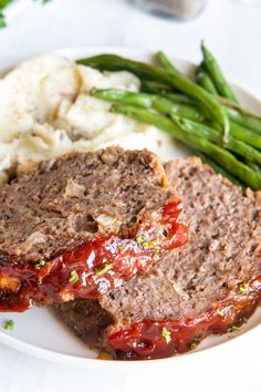 meatloaf, mashed potatoes and green beans on a plate